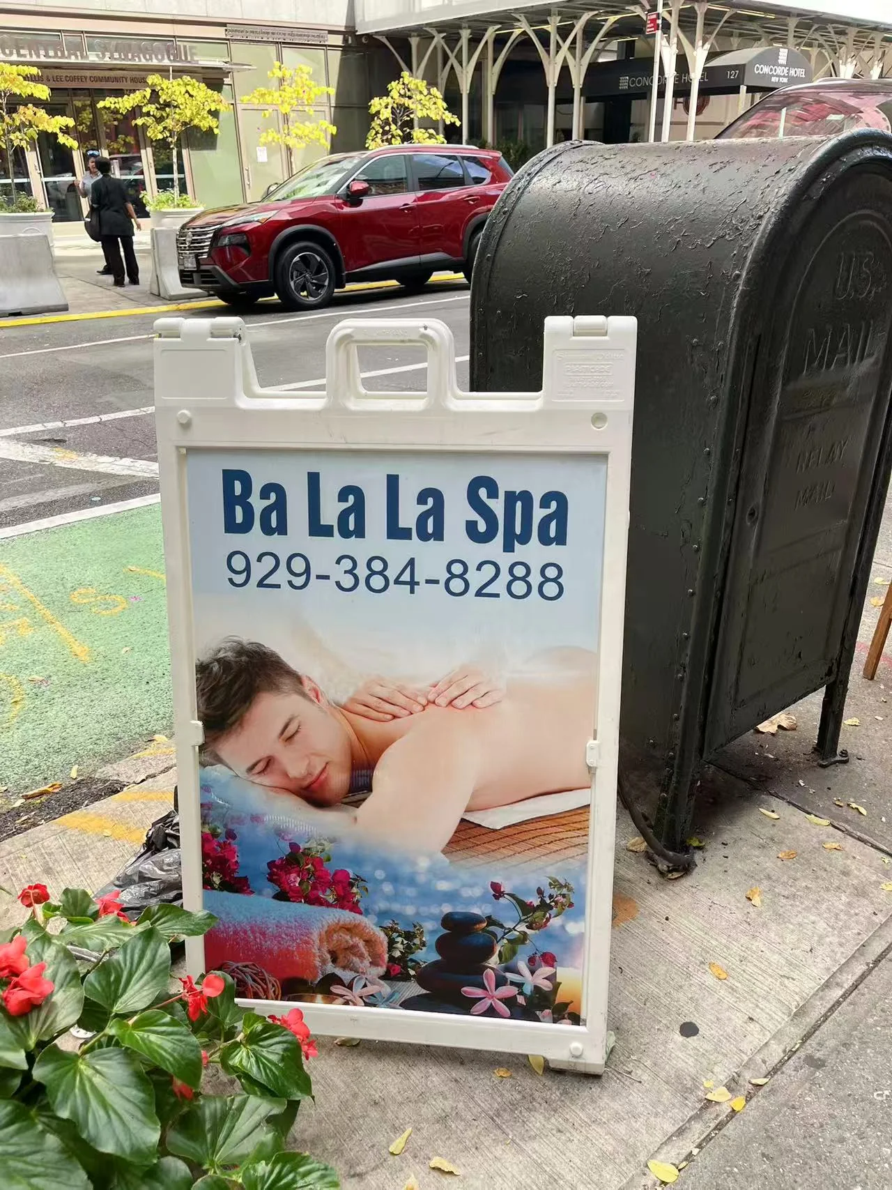 Bala Bala Spa sidewalk sign showing 929-384-8288